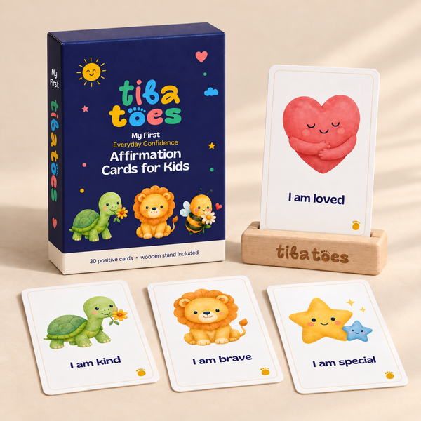 My First affirmation deck with yellow Everyday Confidence subtitle, version name on the box side, sample cards and wooden stand. Product design mockup.