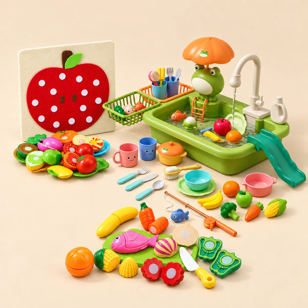 Little Kitchen Play Gift with Froggy Wash Station, Apple Deluxe felt food board and Little Chef Mix cutting toy foods arranged on a warm beige studio surface.