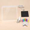 TibaToes™ GlowScribble Light-Up Drawing Board shown in a warm beige studio with realistic depth.