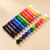 TibaToes™ RainbowGlide Washable Paint Sticks shown in a warm beige studio with realistic depth.