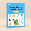 NumberQuest Tracing Workbook. Clean product photograph on a warm beige studio surface.