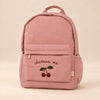 Little Explorer Large Backpack. Clean product photograph on a warm beige studio surface.