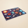 Galaxy Match Solar System Board with colourful planet, astronaut, rocket and UFO puzzle pieces on a warm beige background.