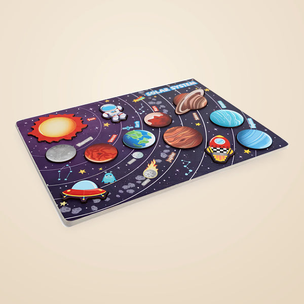 Galaxy Match Solar System Board with colourful planet, astronaut, rocket and UFO puzzle pieces on a warm beige background.