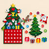 Felt Christmas countdown tree with 24 pockets beside the separate Fridge Christmas Scene magnet set on warm beige.