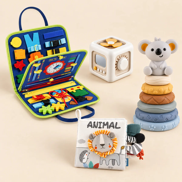 Dinosaur Blue busy board with an off-white and yellow activity cube, ANIMAL lion cloth book and six-ring koala stacking tower on a calm beige background.
