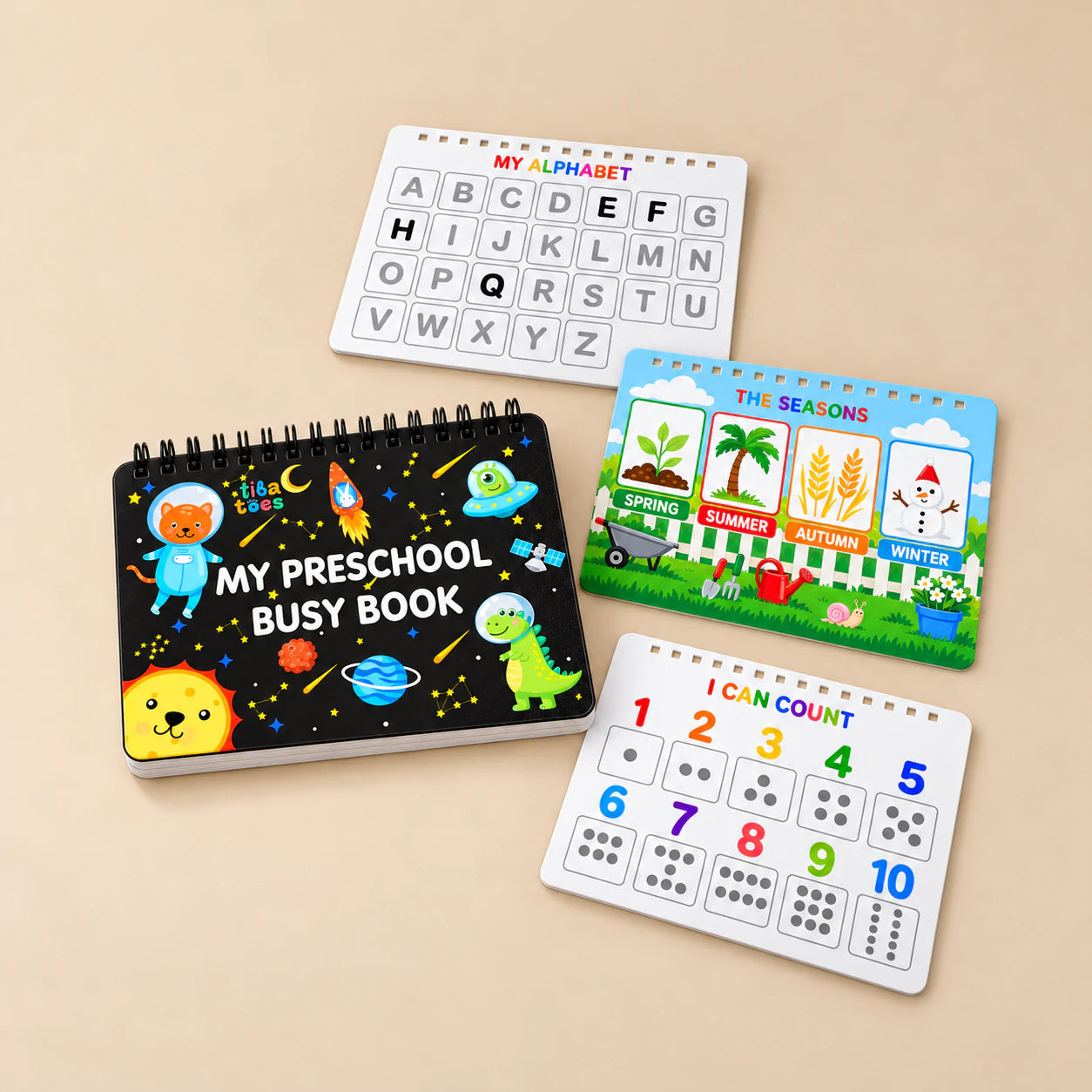 Black TibaToes Preschool Busy Book with alphabet, seasons and counting page previews arranged on a warm beige studio surface