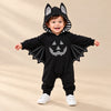 Little Bat Hooded Romper on a warm beige studio background