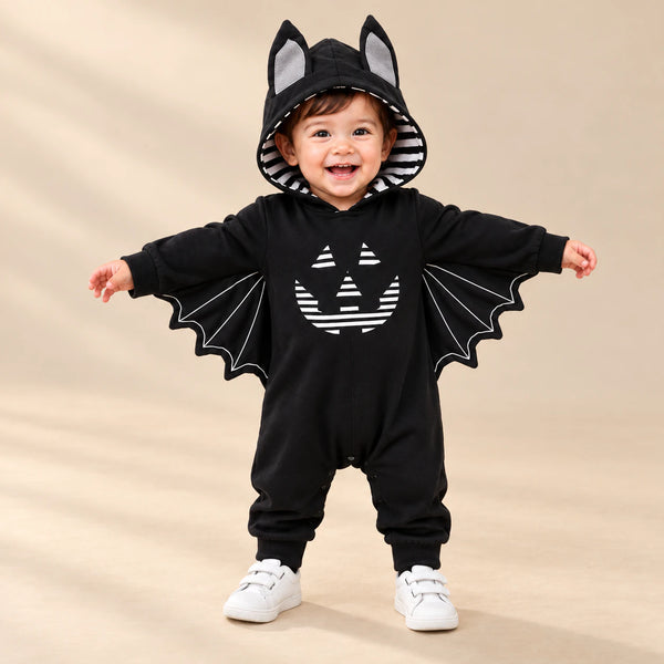 Little Bat Hooded Romper on a warm beige studio background