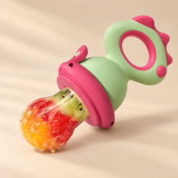 Dino Fresh Food Feeder on a warm beige studio background
