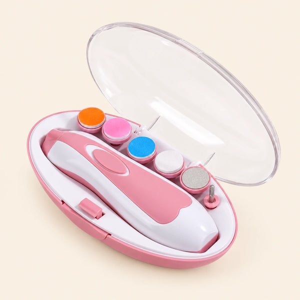 Open pink case with white nail trimmer and six attachments on warm beige.