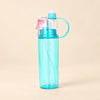 TibaToes™ MistSip Bottle in the photographed blue design on a calm warm beige background.
