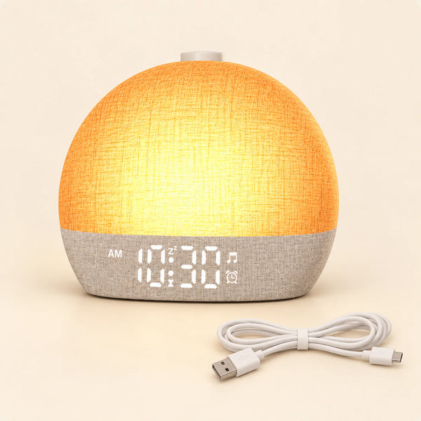 SunriseGlow Sound Alarm Clock and its included USB cable on a smooth warm beige background.