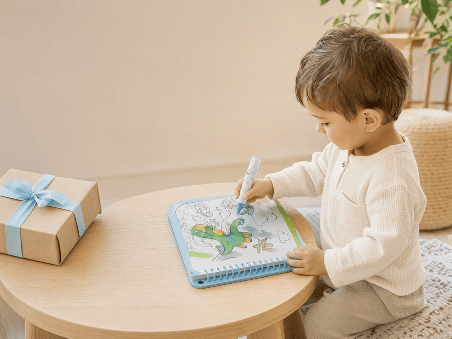 Toddler absorbed in a MagicSplash water drawing book on a road trip