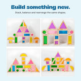 Four different structures made by arranging the same rainbow block shapes.