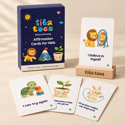 Brave & Growing affirmation deck with navy TibaToes box, four sample cards and wooden stand. Product design mockup.