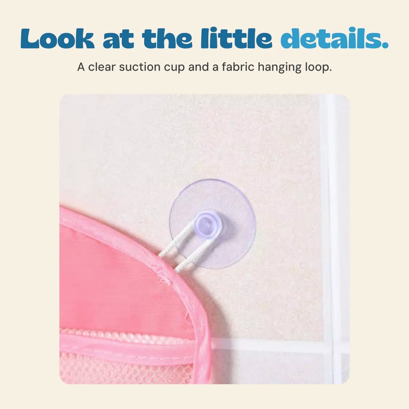 Original close-up of the clear suction cup and fabric loop attached to the pink organizer.
