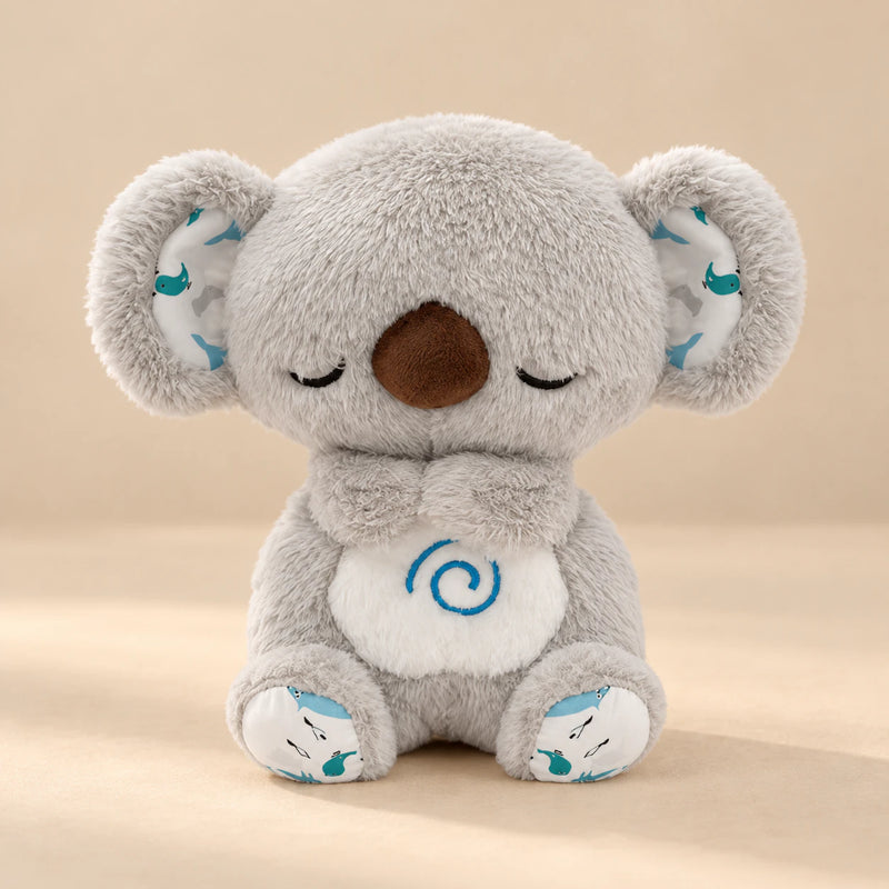 Classic Koala Breathing Buddy with a blue spiral on its white belly.