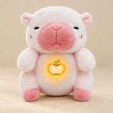 Blush Pink Capybara Breathing Buddy plush with pink muzzle and feet, and an apple belly light.