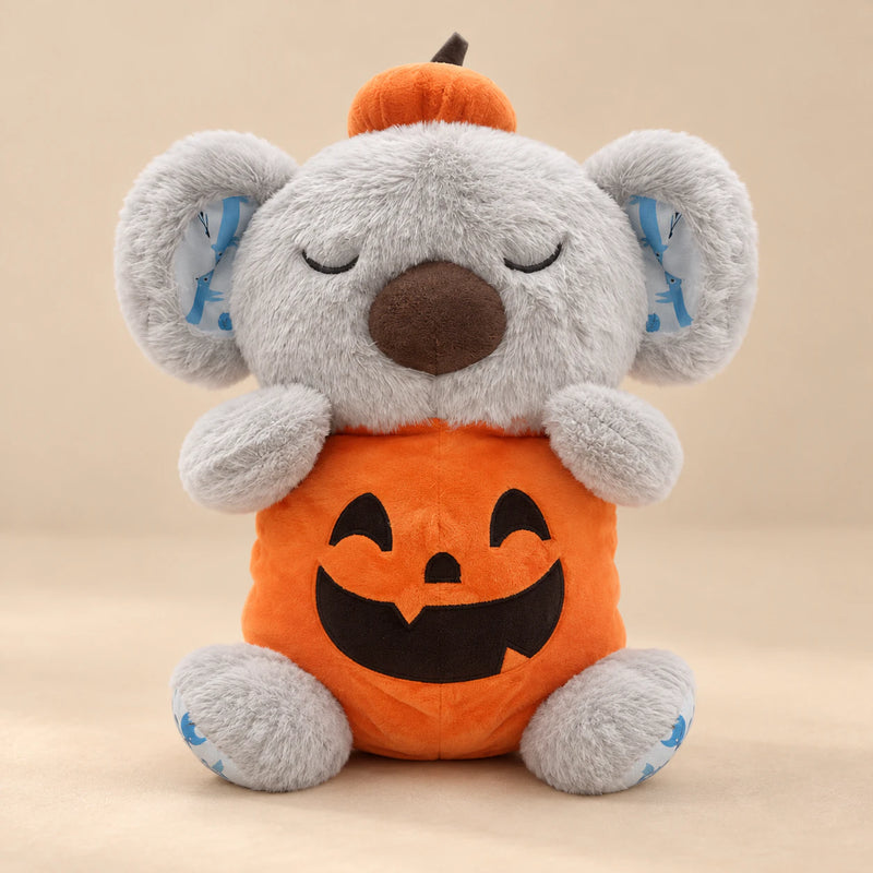 Pumpkin Koala Breathing Buddy with orange pumpkin costume and matching hat.