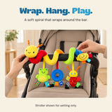 Adult hands position the BusyBuggy soft spiral around the front bar of an empty stroller.