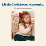 A girl holds a small Santa-hat duck from the Winter Blue calendar.