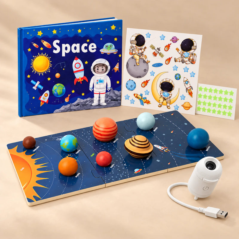 Big Space Adventure Gift with GalaxyGlow USB projector, eight-planet solar system board, blue Space quiet book and astronaut glow stickers on a warm beige studio surface.