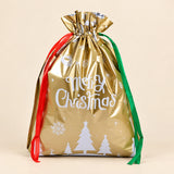 TibaToes Christmas Gift Bag, Large, Christmas Forest Gold, ribbon closure on a warm beige studio background.