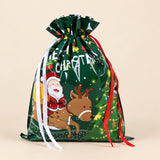 TibaToes Christmas Gift Bag, Large, Santa’s Little Helpers Green, ribbon closure on a warm beige studio background.