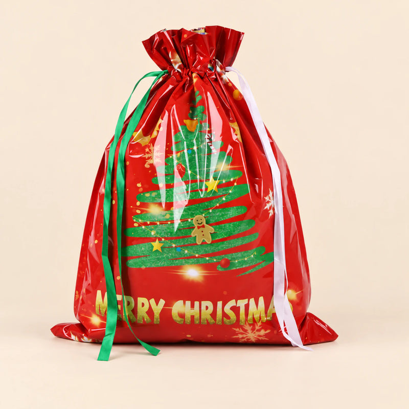 TibaToes Christmas Gift Bag, Large, Twinkly Tree Red, ribbon closure on a warm beige studio background.