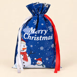 TibaToes Christmas Gift Bag, Medium, Frosty Friends Blue, ribbon closure on a warm beige studio background.