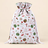 TibaToes Christmas Gift Bag, Medium, Jingle Party White, ribbon closure on a warm beige studio background.