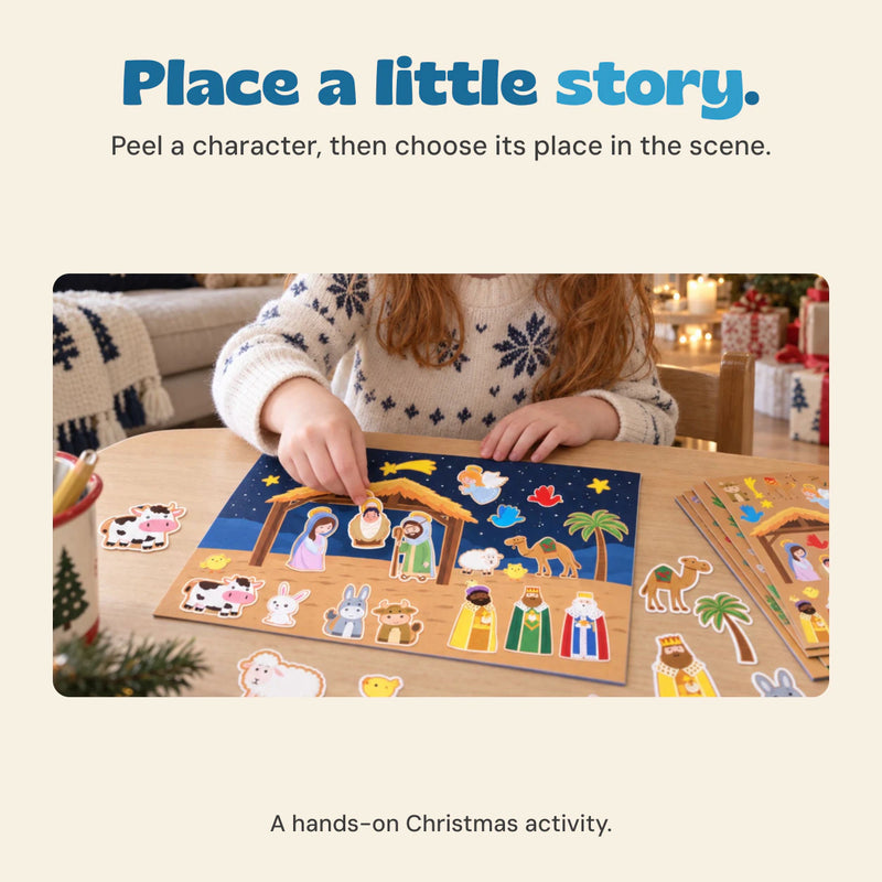 Original hands placing Nativity stickers on a night-sky background, with the character sheet nearby.