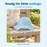 A soft cotton hat to bring along. Bag shown for styling.