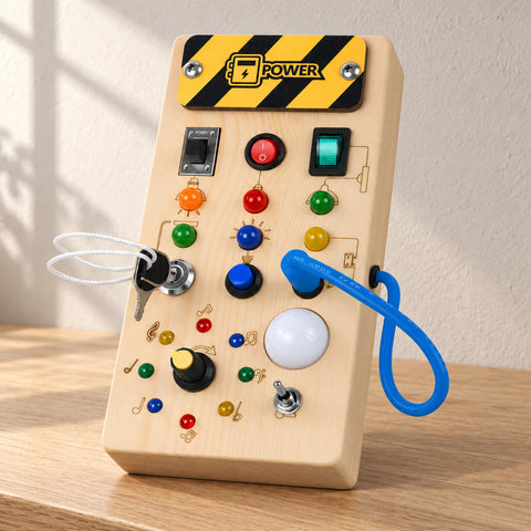 Wooden switch activity board on a warm oak table with natural window light.