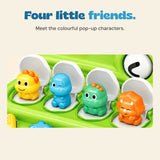 Four original colourful dinosaur characters in their open white-lidded compartments.
