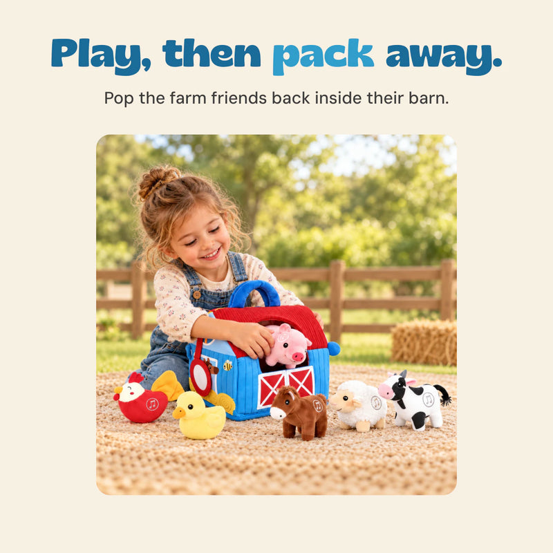 A child places the pink soft pig into the blue barn bag, with the other farm animal toys on the picnic mat.