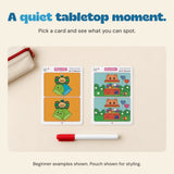 Two unchanged Beginner puzzle cards and marker arranged neatly beside a plain pouch.