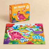 Dinosaur World (48 pieces) puzzle with its matching carry box on a warm beige background
