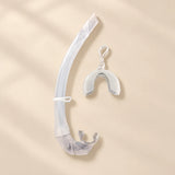TibaToes foldable snorkel in Clear, with its curved silicone tube, mouthpiece, mask keeper and matching storage cover.