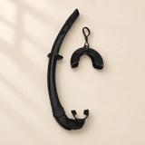 TibaToes foldable snorkel in Classic Black, with its curved silicone tube, mouthpiece, mask keeper and matching storage cover.