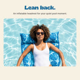 DriftLeaf Ocean Palm pool hammock headrest supporting an adult relaxing in the pool.