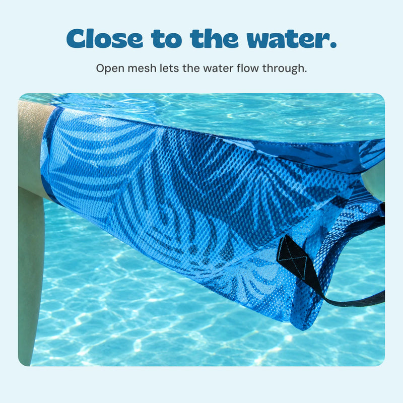 Close-up of the DriftLeaf pool hammock open mesh sling and stitched black strap in the water.
