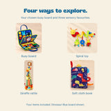 Four included toy types in the Sensory Explorer Bundle: busy board, soft book, giraffe toy and hanging toy. Dinosaur Blue configuration shown.