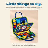 The exact blue dinosaur busy board open to show the buckle, zip, lacing, clock and detachable felt activities.