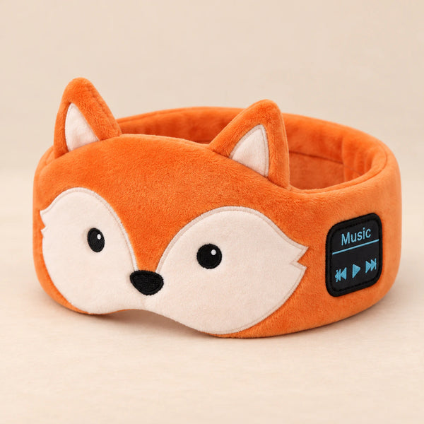 Orange fox CozyCritter audio headband with its original face and side controls.