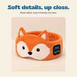 Close view of the orange fox headband and its embroidered face.