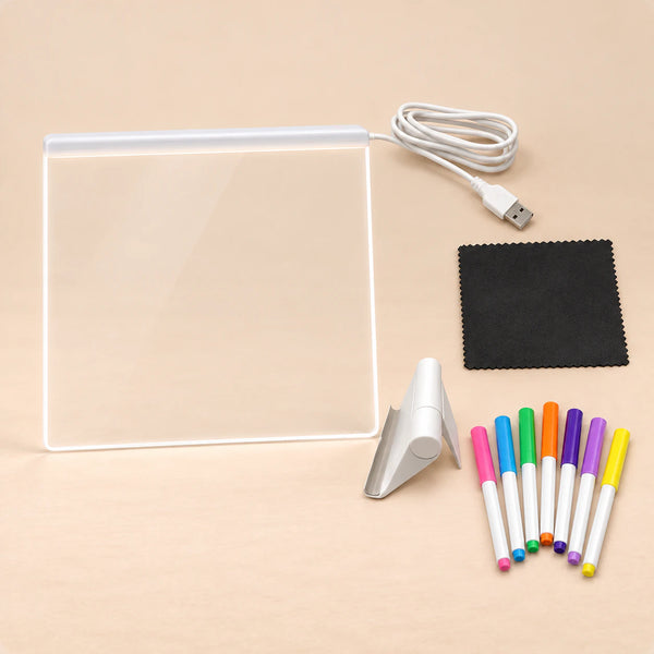 TibaToes™ GlowScribble Light-Up Drawing Board shown in a warm beige studio with realistic depth.