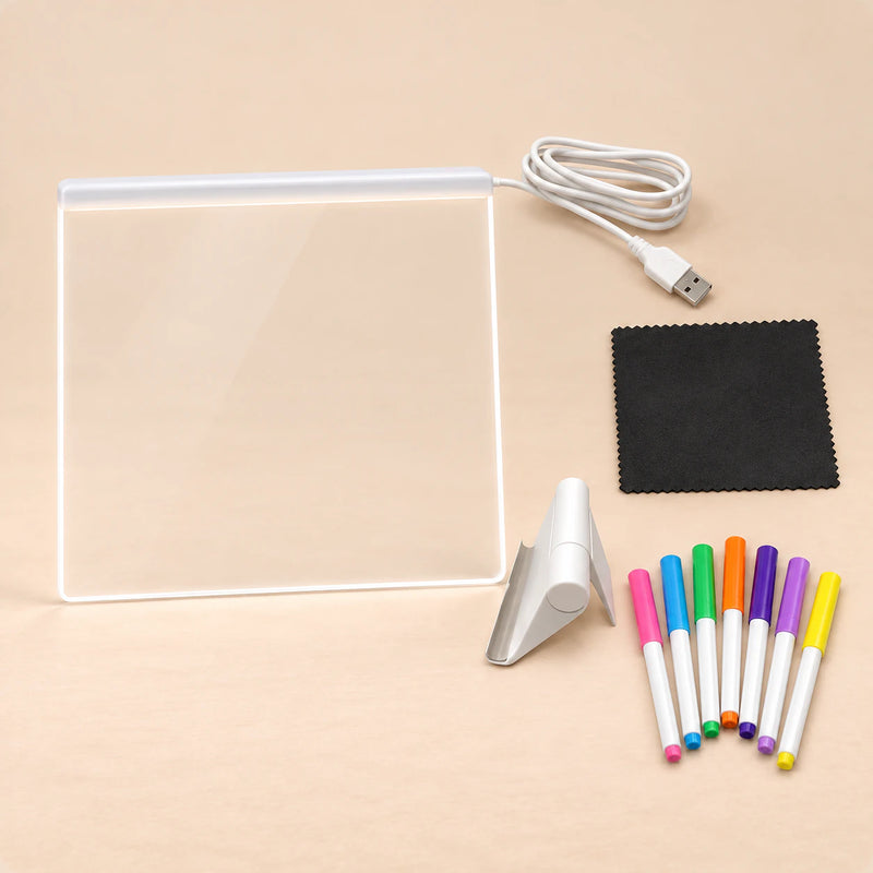 TibaToes™ GlowScribble Light-Up Drawing Board shown in a warm beige studio with realistic depth.