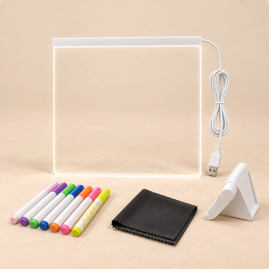 TibaToes™ GlowScribble Light-Up Drawing Board shown in a warm beige studio with realistic depth.